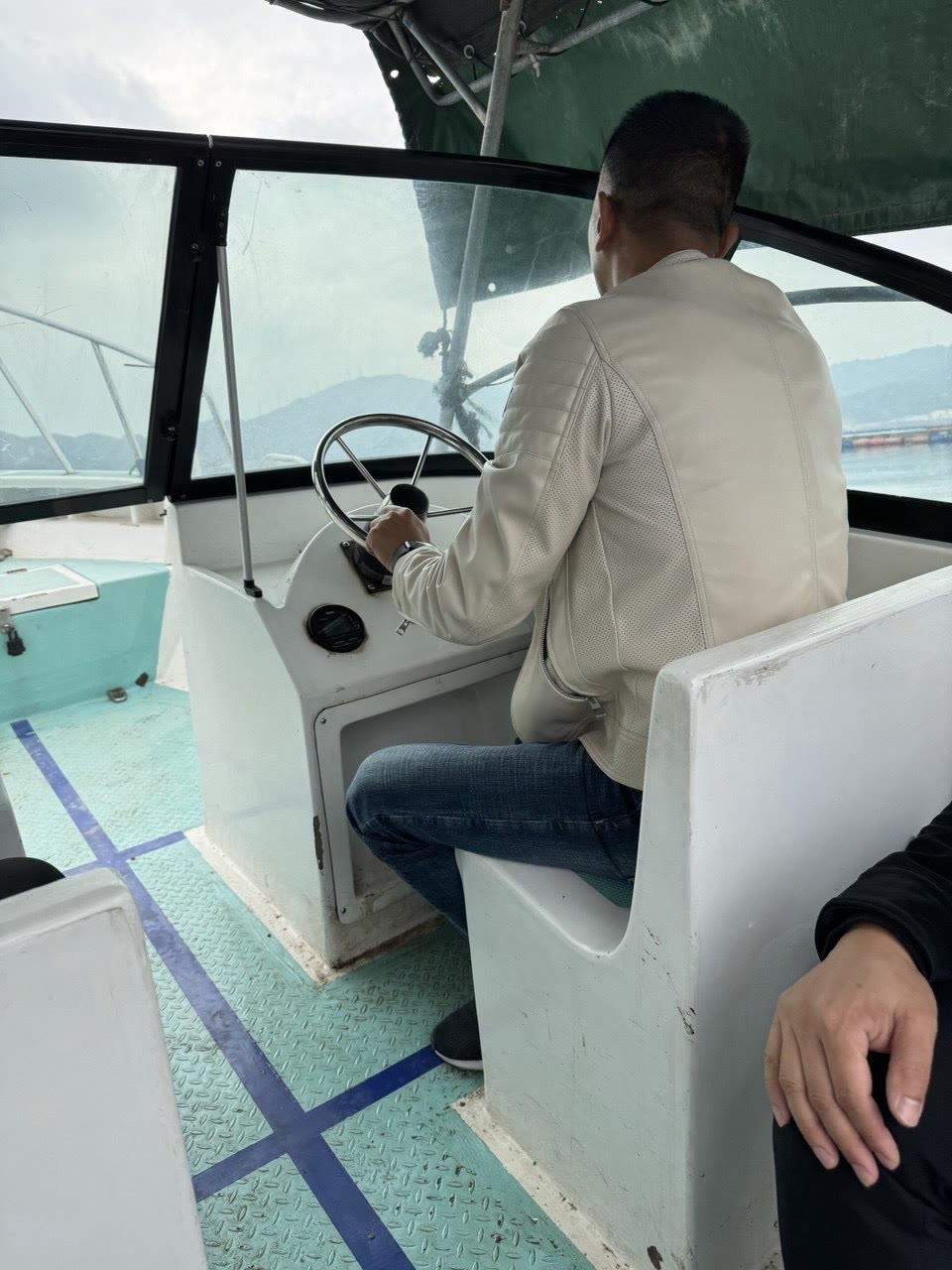 Our founder at the helm, heading out to the sea farm in Ningde, Fujian